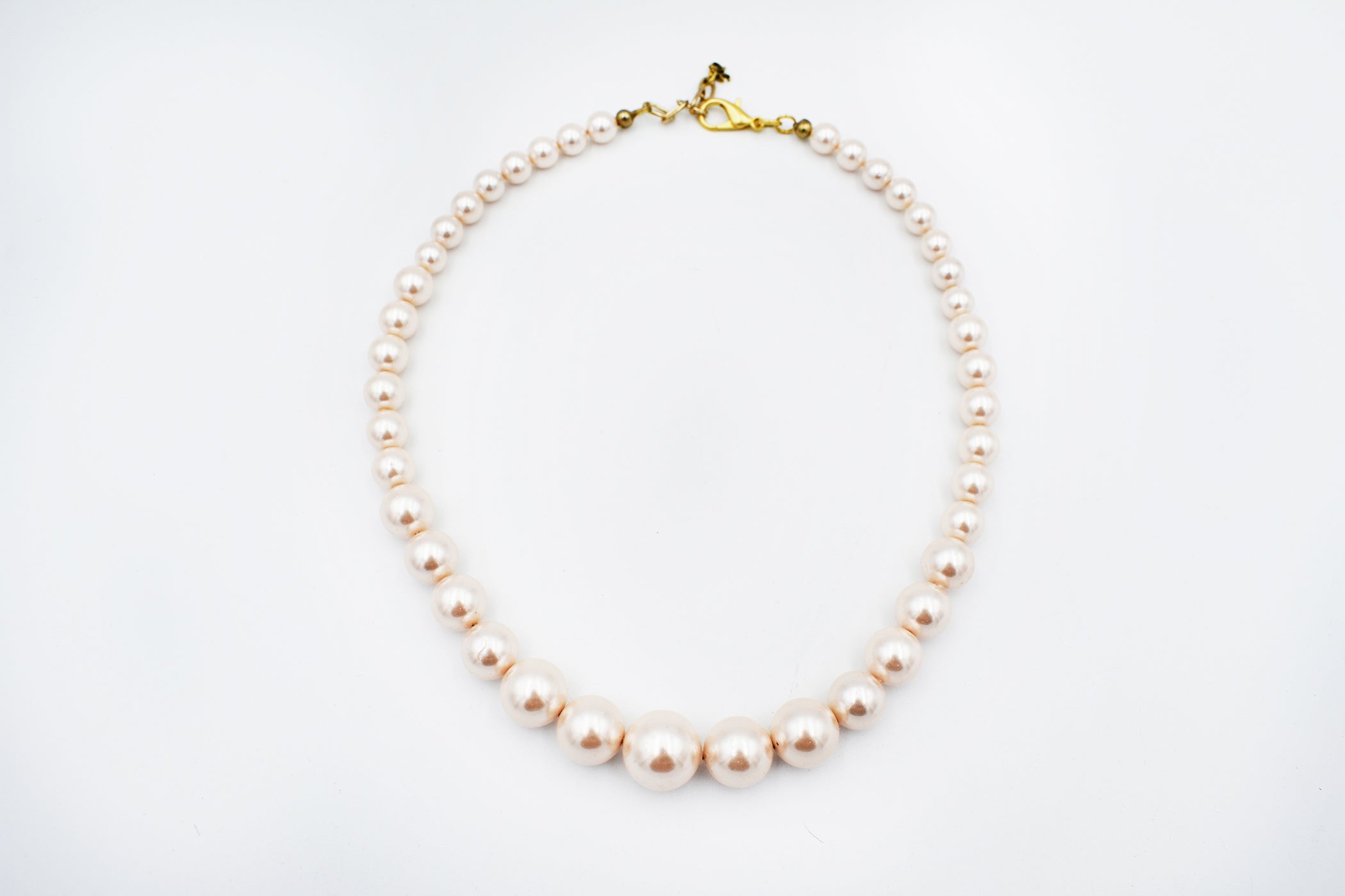 Graduated Light Pink Mother of Pearl Necklace
