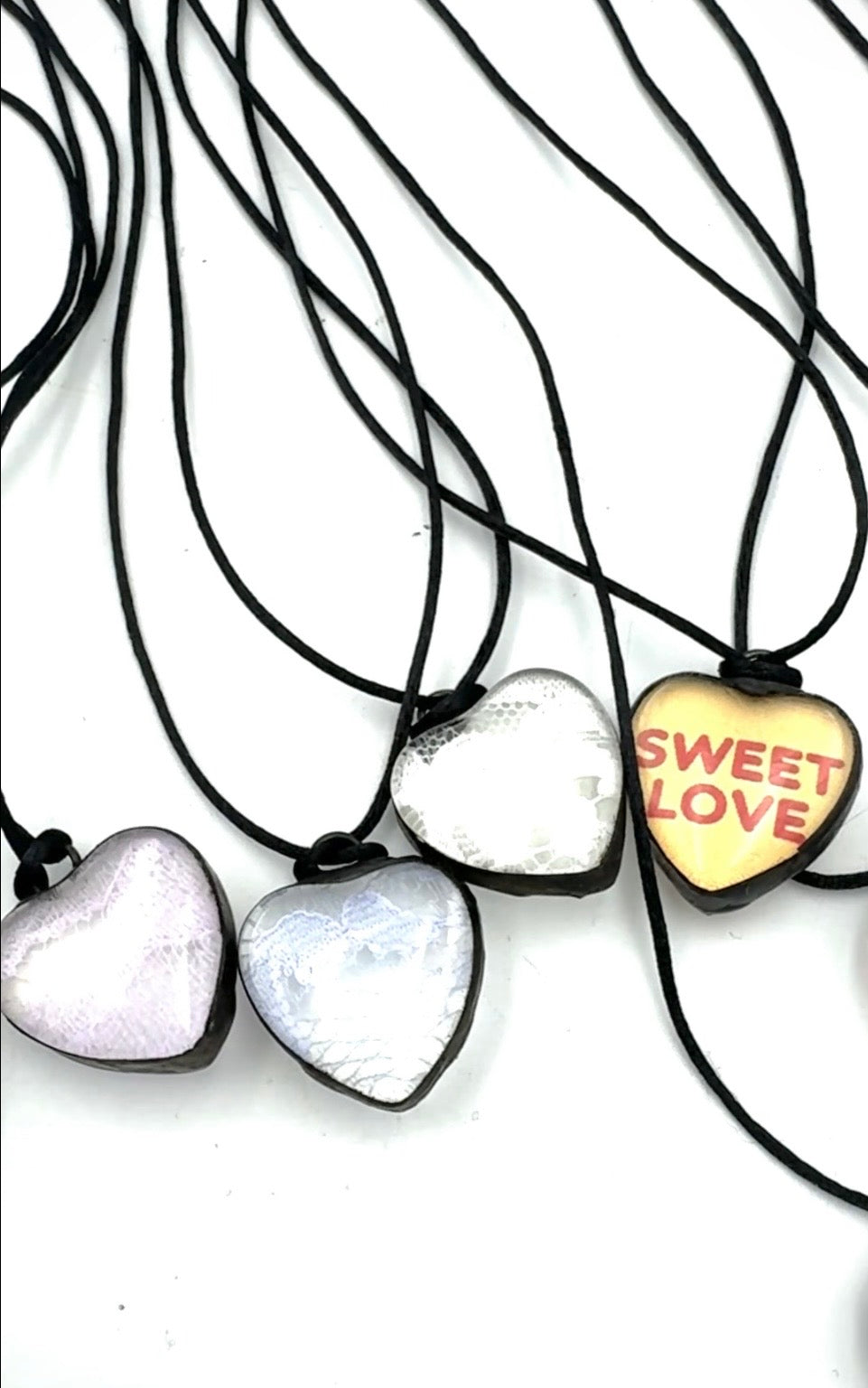 Conversation and Lace Heart Necklaces