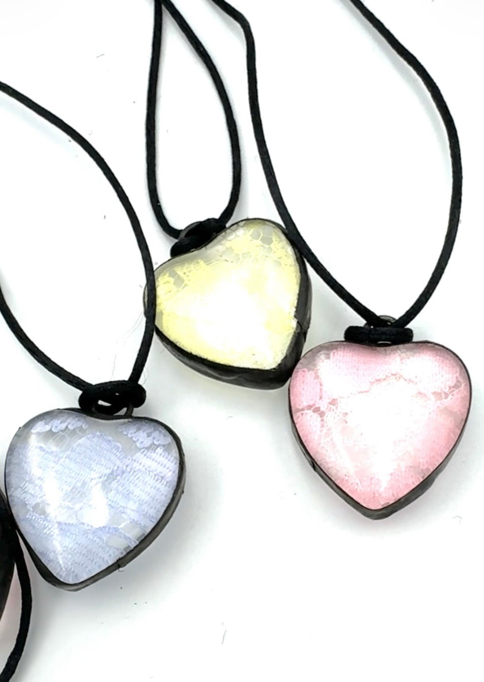 Conversation and Lace Heart Necklaces